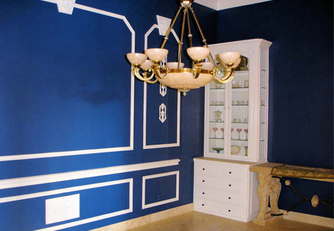 Newly painted blue walls with white trim