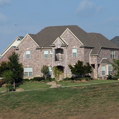 Exterior of brick home in New Hope by Platinum Painting