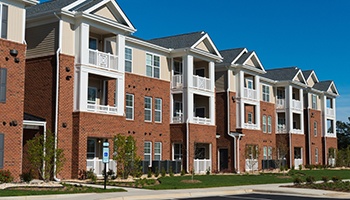 a suburban apartment building during the day
