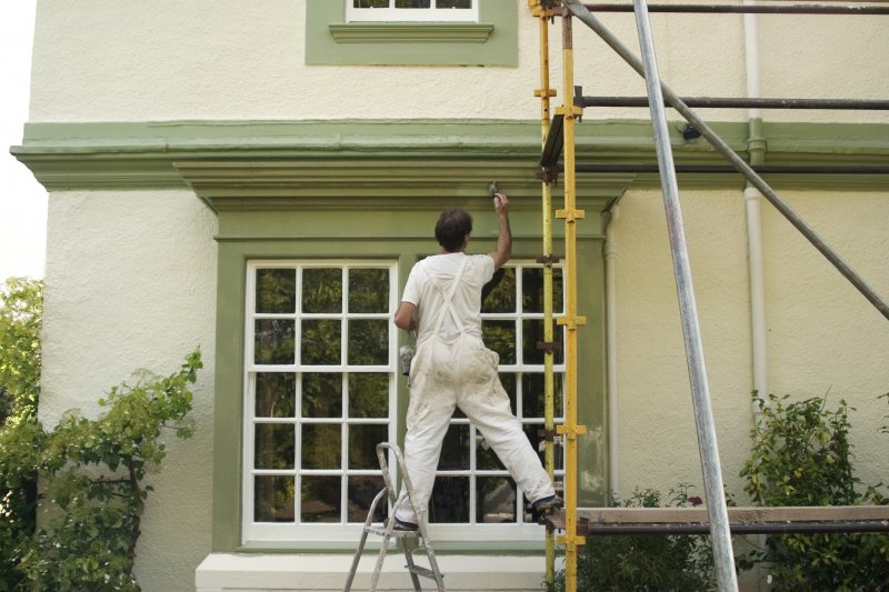 man exterior painting