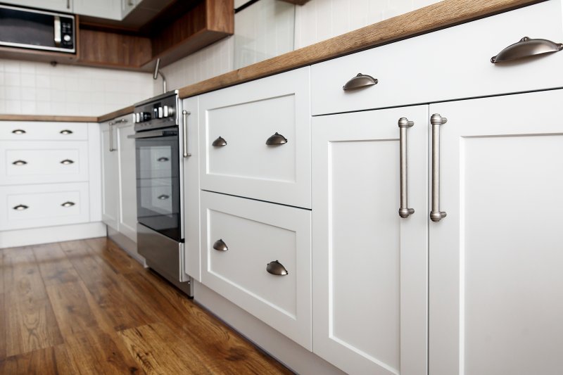 closeup of white kitchen cabinets