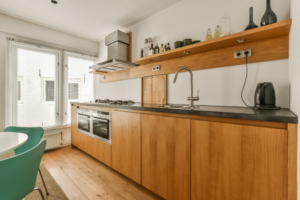 a modern kitchen that’s been painted white